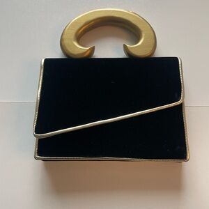 Elegant Black and Gold Handbag